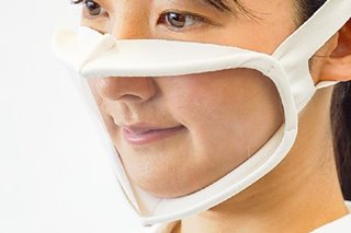 LOOK: Japan company unveils see-through face masks to aid the deaf