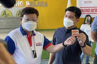 2 lawmakers give out free ivermectin to QC residents
