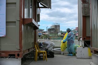 Disinfecting a quarantine facility in Navotas