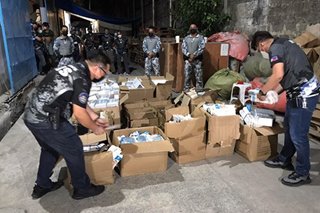Warehouse ng umano'y smuggled na mga face shield, sinalakay ng NBI at Customs