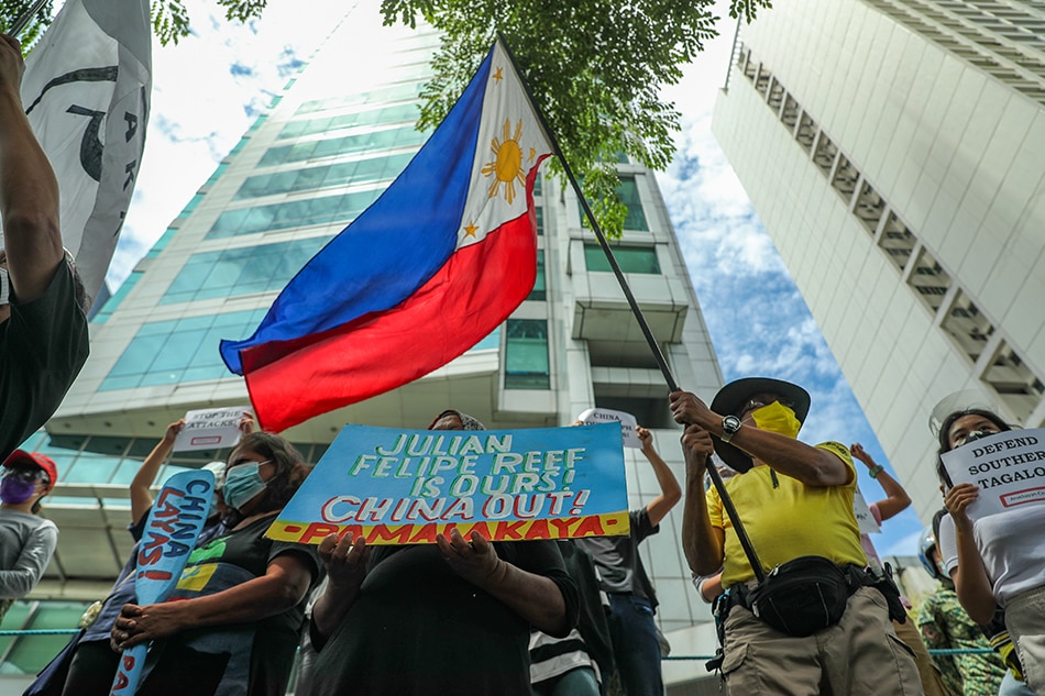 Members of different progressive groups hold a rally in front of the Chinese Consulate in Makati on July 12, 2021, to mark the 5th year of the country’s historic victory at the Permanent Court of Arbitration (PCA) in favor of Philippines’ claim on the West Philippine Sea. ABS-CBN News/File