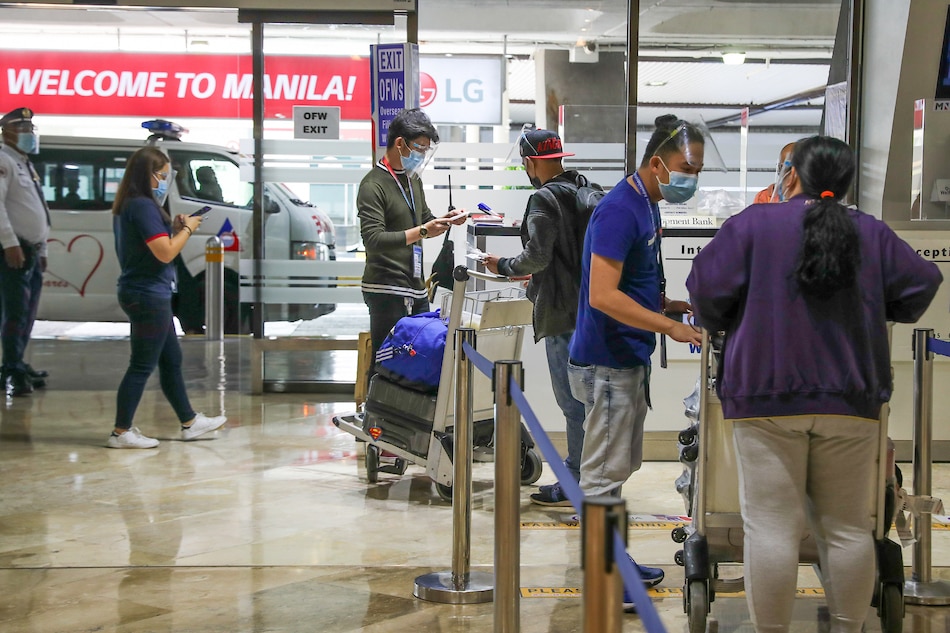 Overseas Filipino workers arrive at the Ninoy Aquino International Airport in Parañaque City on July 1, 2021. Jonathan Cellona, ABS-CBN News/File 