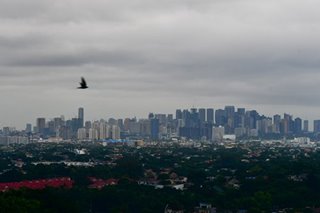 Rain clouds loom over Metro Manila