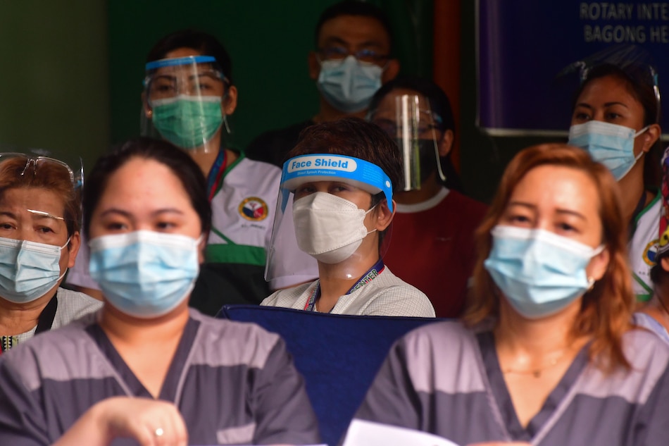 Health workers from the Philippine Orthopedic Center stage a protest in Quezon City on June 21, 2021, lambasting the Department of Health over the reported non-release of funds for meal, accommodation, and transportation benefits under the Bayanihan Law 2. Mark Demayo, ABS-CBN News/File
