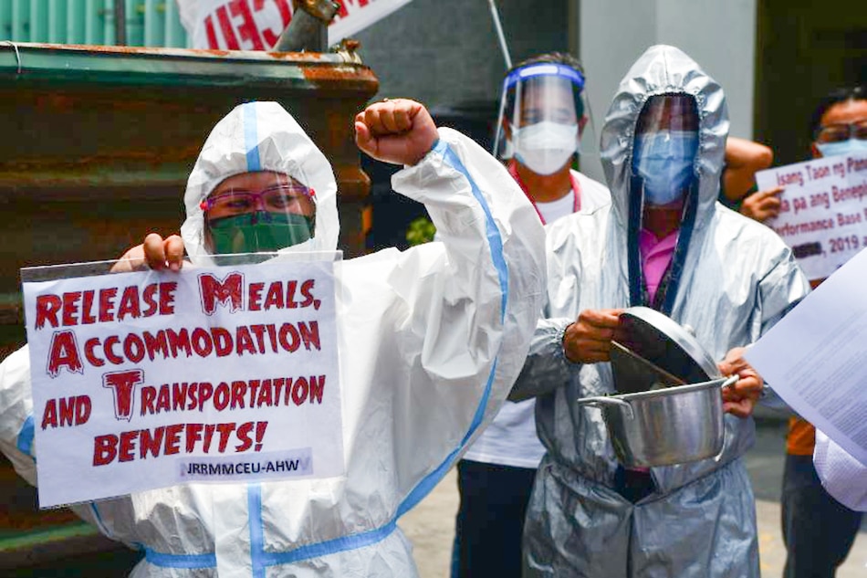 Health workers from Jose Reyes Memorial Medical Center in Manila picket in front of the hospital's lobby on August 25, 2021, calling the government for the release of funds and benefits for special risk allowance and hazard pay allotted to health workers. Mark Demayo, ABS-CBN News