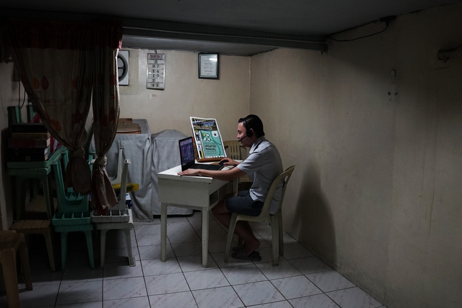 Calvin Alcantara of the Fort Bonifacio National High School teaches online to Grade 10 students from his residence in West Zamora, Paco, Manila, September 13, 2021. Mores Heramis, ABS-CBN News