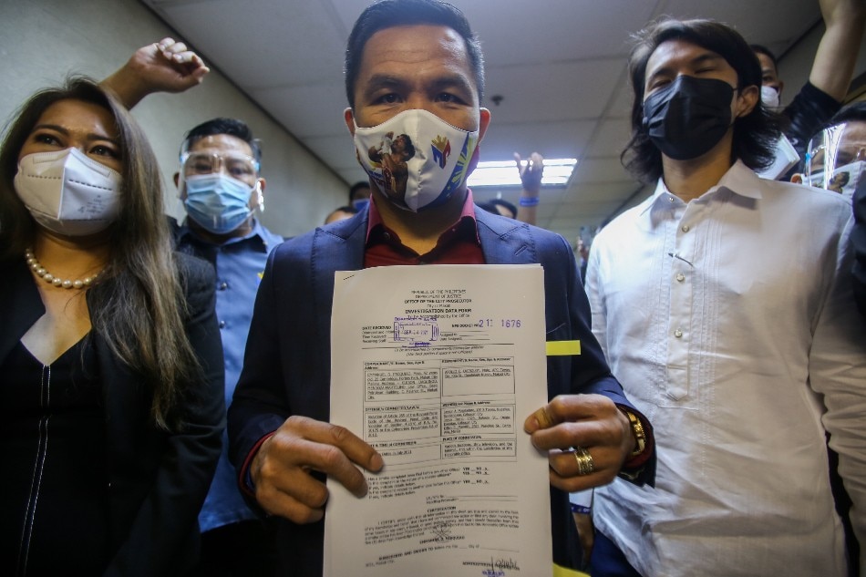 Sen. Manny Pacquiao files a Php100-million libel case against Kingdom of Jesus Christ leader Apollo Quiboloy on at the Makati city Prosecutors Office on September 14, 2021. ABS-CBN News