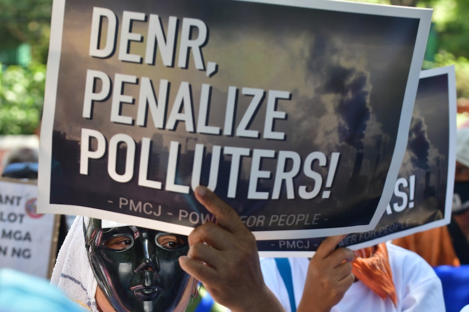 Climate activists join residents of communities affected by pollution from coal-fired power plants as they picket in front of the Department of Environment and Natural Resources in Quezon City on March 5, 2020, calling on the government to increase efforts in ensuring cleaner air. Mark Demayo, ABS-CBN News