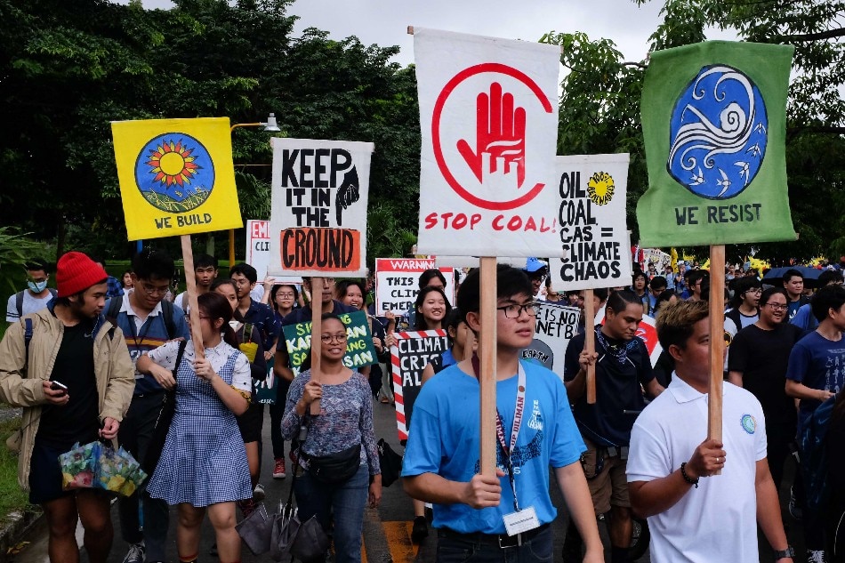 Students protest at University of the Philippines in Diliman, Quezon City, as they join youth-led worldwide climate strikes on September 20, 2019. Joining the students are indigenous people groups, coal-affected communities, coastal villagers and other activists from different parts of the country. George Calvelo, ABS-CBN News/file
