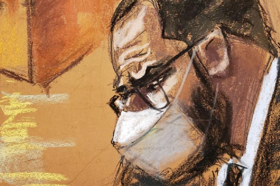 R. Kelly listens as Jeffrey Meeks testifies for the defense during Kelly's sex abuse trial at Brooklyn's Federal District Court in a courtroom sketch in New York, U.S., September 21, 2021. REUTERS/Jane Rosenberg