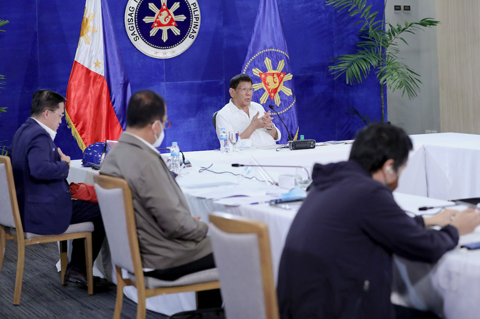President Rodrigo Duterte presides over a meeting with the Inter-Agency Task Force on the Emerging Infectious Diseases (IATF-EID) core members prior to his talk to the people at the Arcadia Active Lifestyle Center in Matina, Davao City on Sept. 22, 2021. Arman Baylon, Presidential Photo/File 