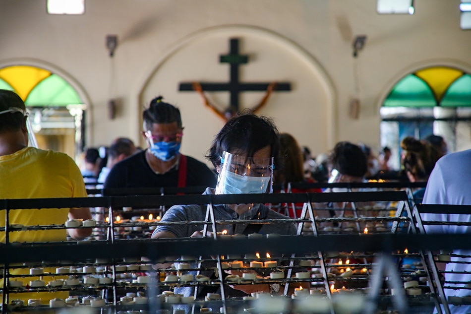 People offer prayers at Baclaran Church on Sept. 29, 2021. 