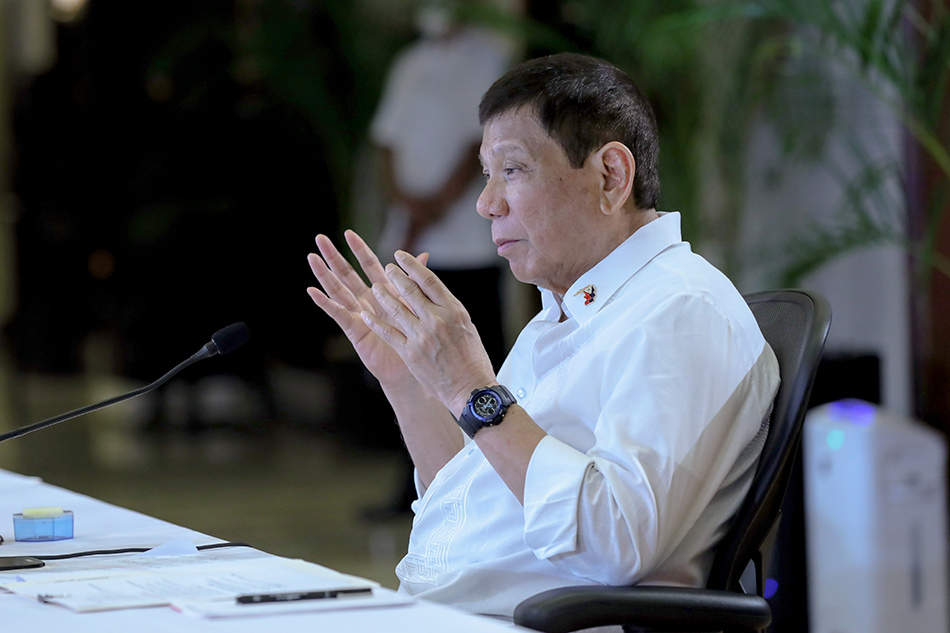 President Rodrigo Duterte presides over a meeting with the Inter-Agency Task Force on the Emerging Infectious Diseases (IATF-EID) core members prior to his talk to the people at the Malacañang Palace on September 27, 2021. Richard Madelo, Presidential Photo