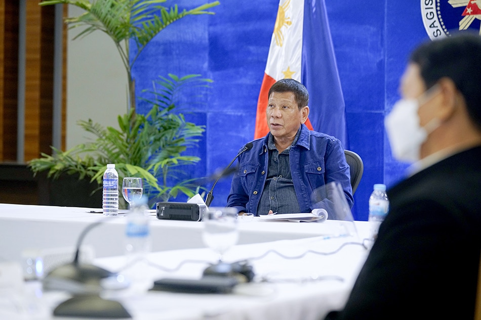 President Rodrigo Duterte talks to the people after holding a meeting with the COVID-19 task force at the Arcadia Active Lifestyle Center in Matina, Davao City on Oct. 11, 2021. Roemari Lismonero, Presidential Photo