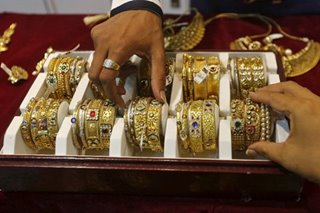 Indians sell family gold to tide over pandemic crunch