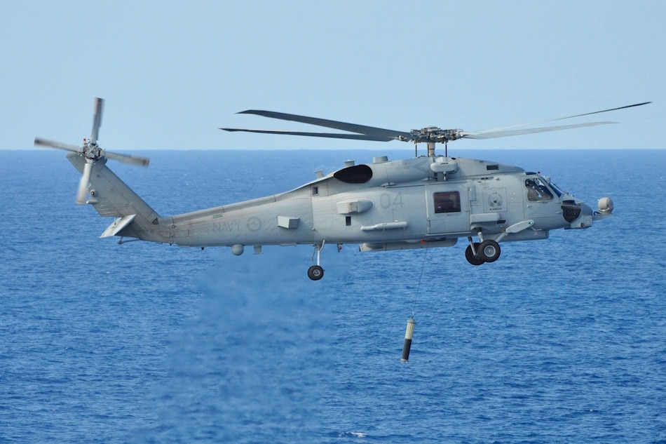 The Royal Australian Navy’s MH-60R Romeo helicopter conducts functional testing of the newly fitted Airborne Low Frequency Sonar System (ALFS) off the coast of Jacksonville, Florida. It is the same type of helicopter involved in the incident at the Philippine Sea. Photo from the Royal Australian Navy website