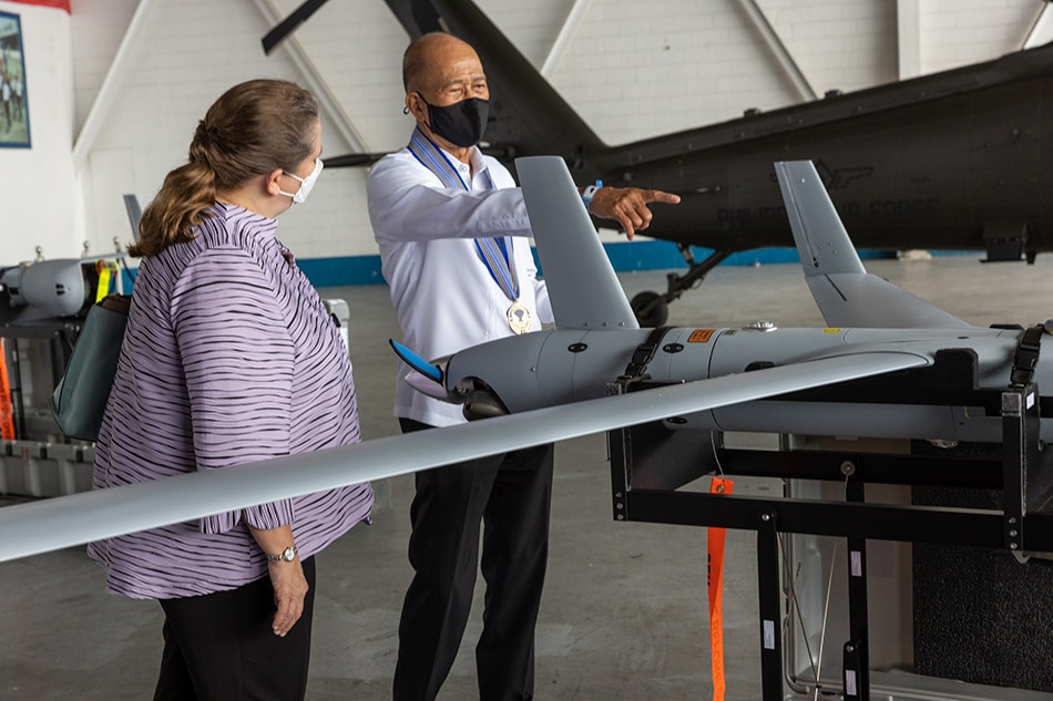 Chargé d’Affaires, ad interim Heather Variava joins Defense Secretary Delfin Lorenzana during the ScanEagle Unmanned Aerial Systems turnover ceremony at the Clark Air Base in Mabalacat City, Pampanga, Oct. 13, 2021