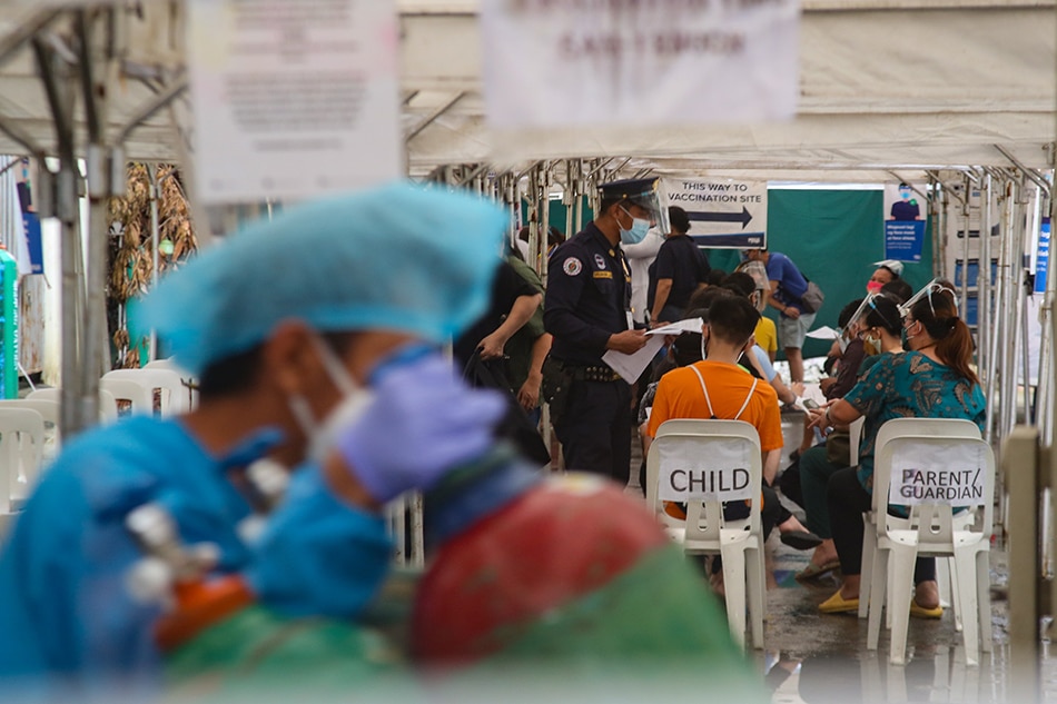 Children line-up to get inoculated with the COVID-19 vaccine at the Pasig City General Hospital in Pasig City on October 15, 2021. Jonathan Cellona, ABS-CBN News