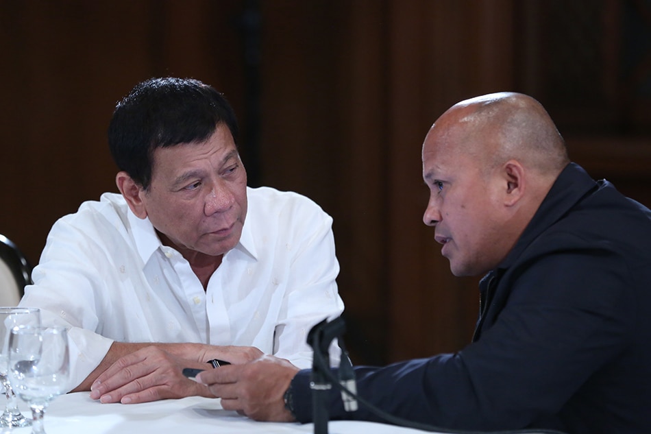 President Rodrigo Duterte listens to the report of Philippine National Police Chief Ronald Dela Rosa in a meeting held in the State Dining Room in Malacañan on Aug. 16, 2016. King Rodriguez, Malacanang Photo/File