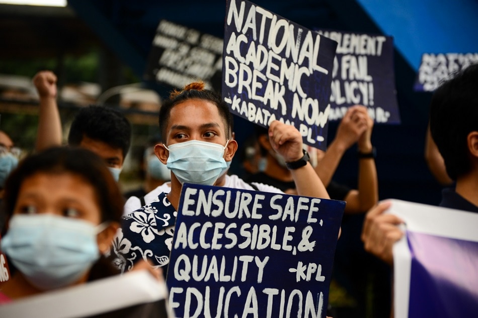 Students of Ateneo De Manila University, along with other youth groups, call for an academic break and accountability against the government’s response to education amid the COVID-19 pandemic during a protest along Katipunan Ave. in Quezon City on November 25, 2020. Mark Demayo, ABS-CBN News/File