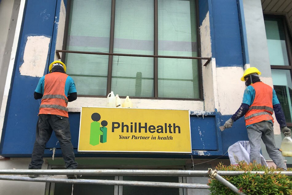 Workers paint the walls of a hospital in Quezon City on Aug. 15, 2019. ABS-CBN News/File