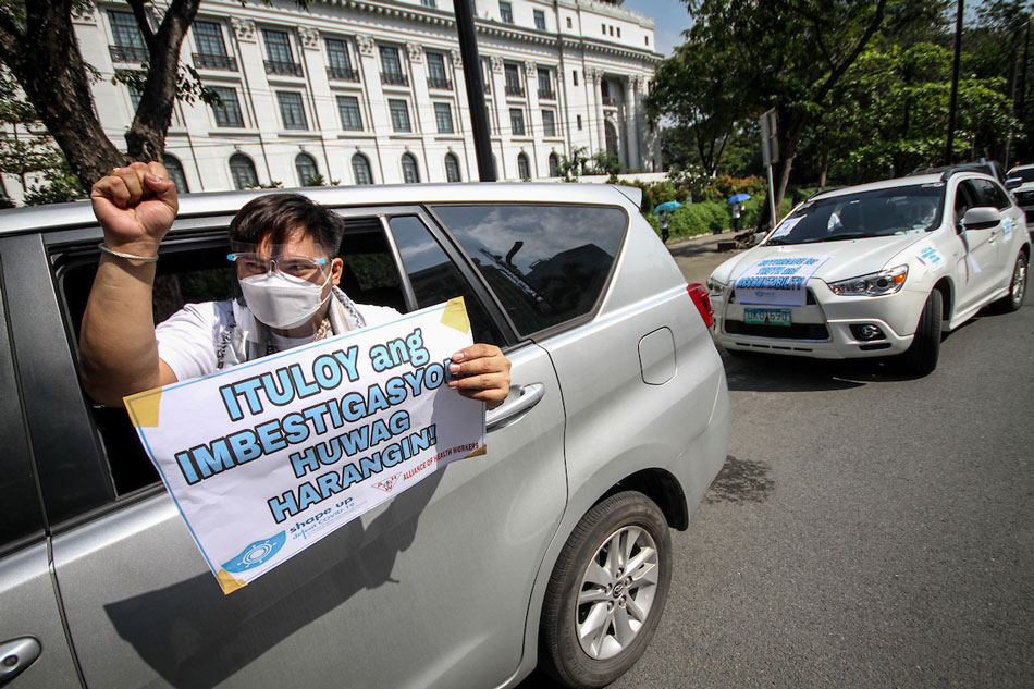 Doctors and other health professionals hold a motorcade along T.M Kalaw in Manila on Oct. 19, 2021, in protest against the Department of Health's transaction with Pharmally Corporation. ABS-CBN News/File