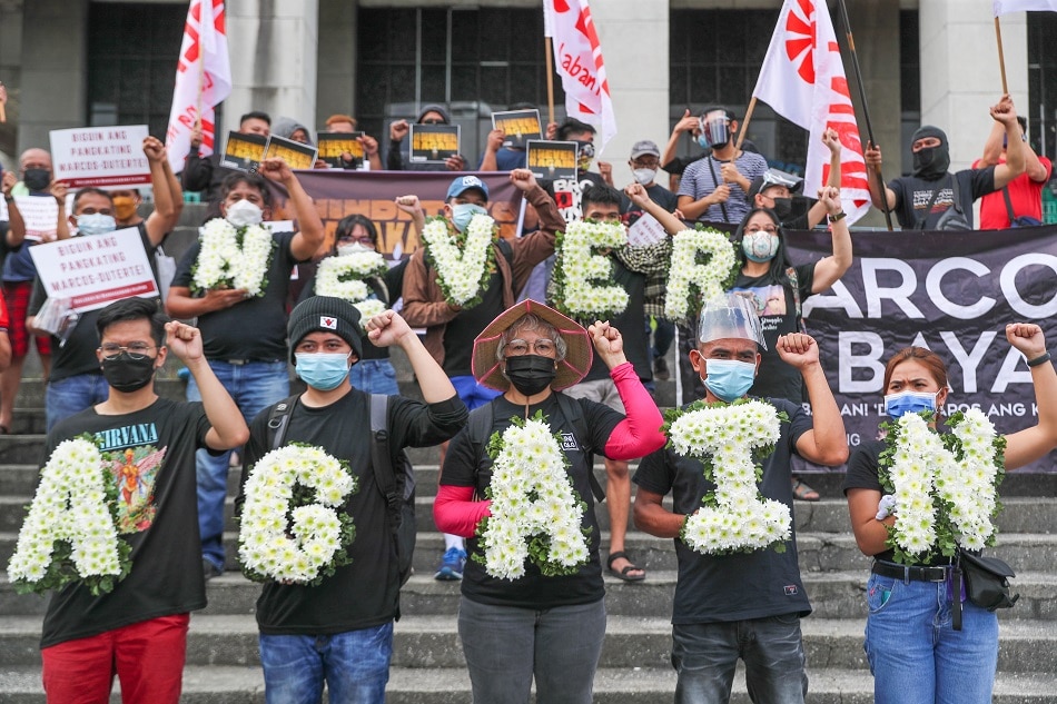 Labor Groups hold a commemorative protest at the steps of the Film Center of the Philippines at the Cultural Center of the Philippines (CCP) compound in Pasay City on November 17, 2021. The group paid tribute to the workers who were trapped and killed after the scaffolding collapsed during its construction on November 17, 1981. Jonathan Cellona, ABS-CBN News
