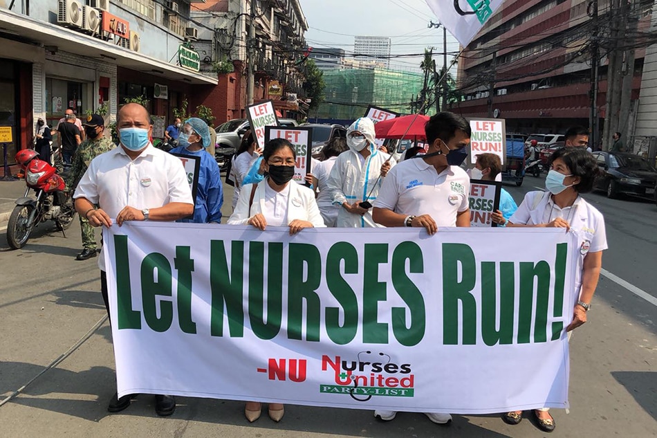 Member of Nurses United picketed outside Comelec HQ on Nov. 22, 2021 to appeal their rejection as party-list group. Ina Reformina, ABS-CBN News