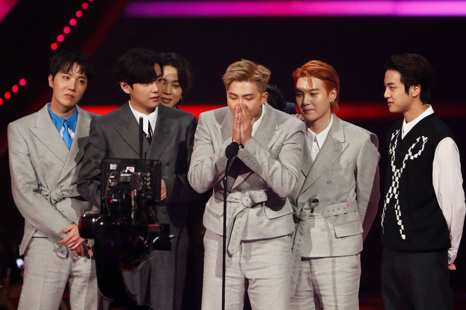 BTS receives an award for Artist of the Year at the 49th Annual American Music Awards at the Microsoft Theatre in Los Angeles, California. Mario Anzuoni, Reuters