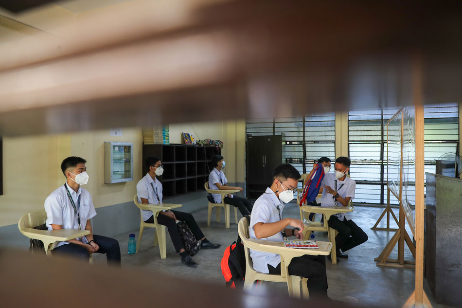  Students attend the pilot implementation of face-to-face classes at Mother of Good Counsel Seminary in San Fernando, Pampanga on November 22, 2021 as it reopens for a limited number of pupils. Jonathan Cellona, ABS-CBN News