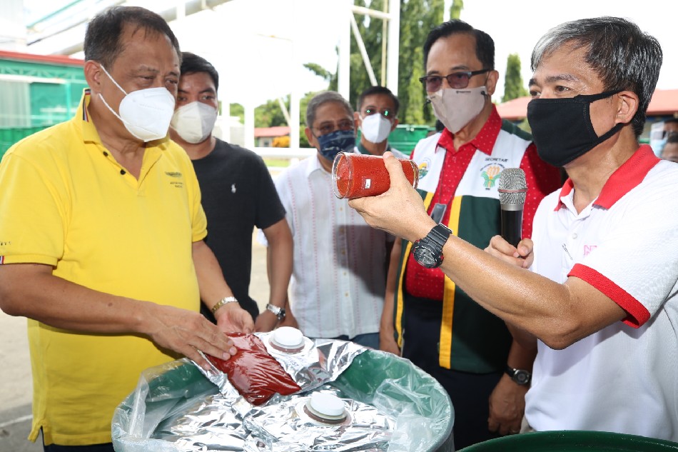 Officials visit the Northern Foods Corporation in Sarrat, Ilocos Norte, Sept. 26, 2020. Department of Agriculture website/File 