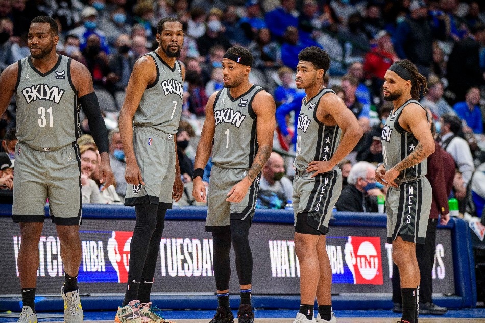 Brooklyn Nets forward Paul Millsap (31) and forward Kevin Durant (7) and forward Bruce Brown (1) and guard Cam Thomas (24) and guard Patty Mills (8) wait for play to resume against the Dallas Mavericks during the second quarter at the American Airlines Center. Jerome Miron, USA TODAY Sports/Reuters