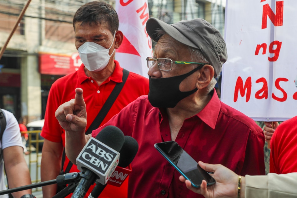 Vice presidential aspirant Prof. Walden Bello gives a statement as workers’ rights advocates hold a protest rally near the Mendiola bridge in Manila, in commemoration of Bonifacio Day on November 30, 2021. Jonathan Cellona, ABS-CBN News.