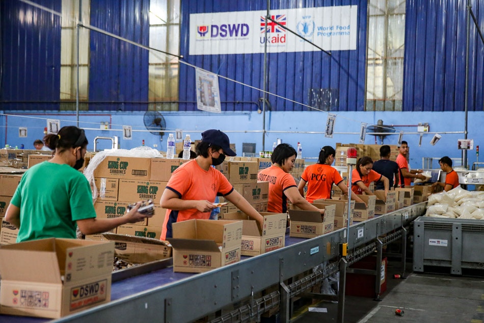 PCG helps DSWD pack relief goods