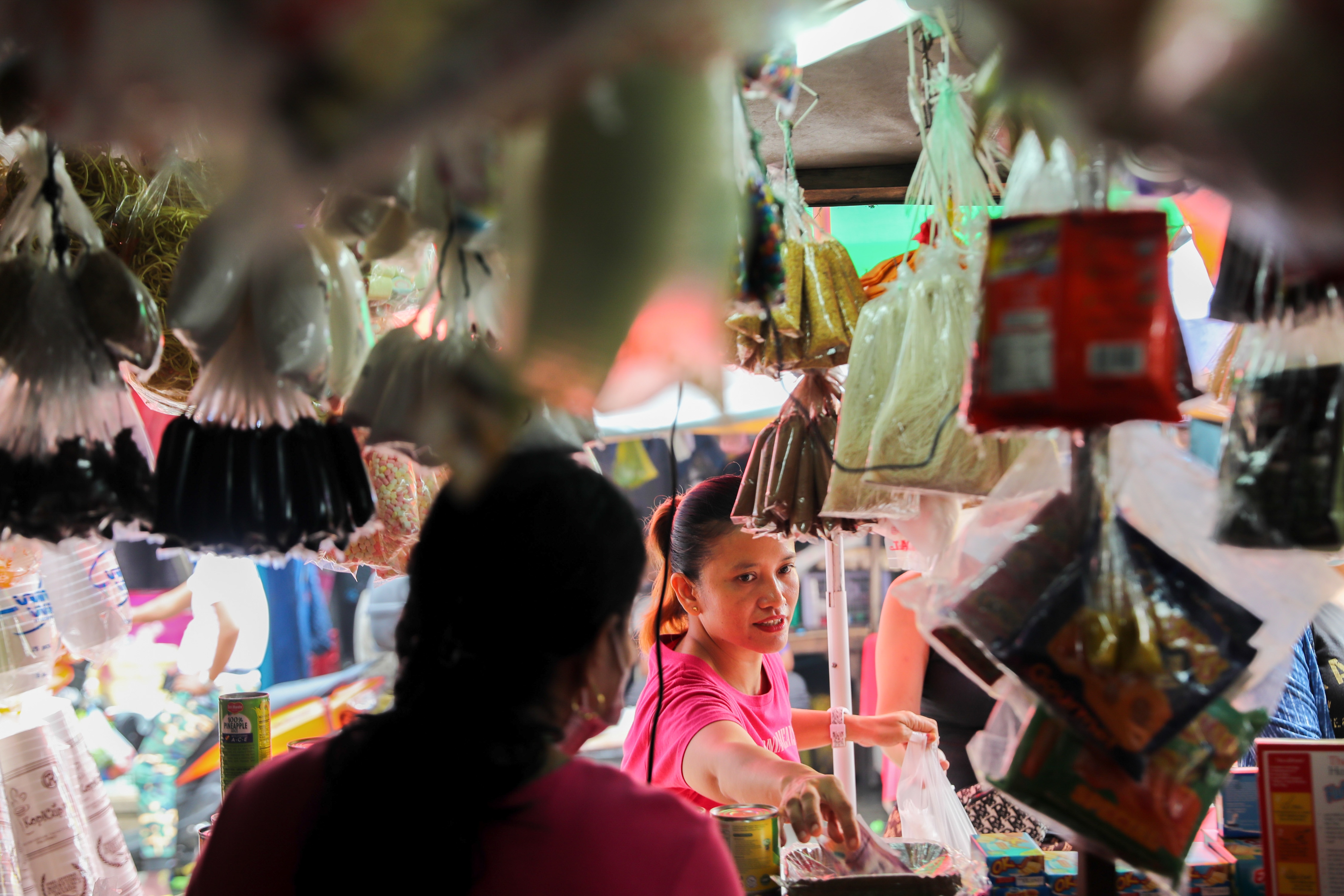 People buy traditional ‘Noche Buena’ (Christmas dinner) items at the Blumentritt Market in Manila on December 20, 2021. Jonathan Cellona, ABS-CBN News/File