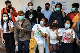 Thai activists answer summons as dozens face charges of insulting king
