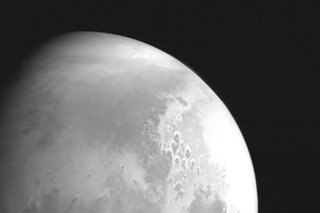 China's space probe sends back its first image of Mars