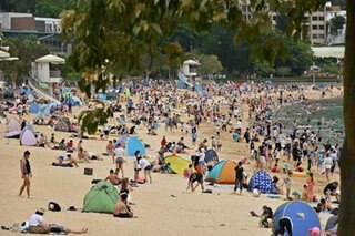 Hong Kong reopens beaches and pools