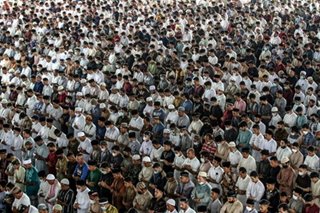 Indonesians gather to pray for Eid al-Adha despite virus surge