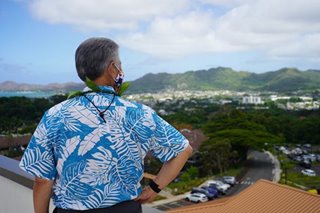 Hawaii gov urges visitors to stay away amid COVID surge