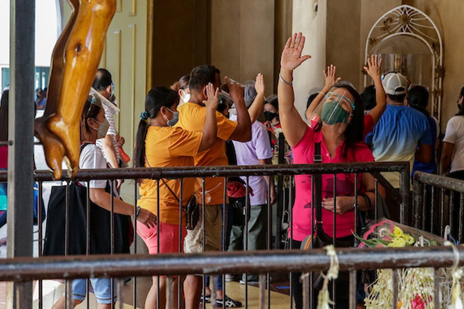 Filipino Catholics visit the National Shrine of Our Mother of Perpetual Help or Baclaran Church for its first Wednesday mass on November 3, 2021. The church allows 30% indoor capacity for fully vaccinated people and 50% outdoor capacity. George Calvelo, ABS-CBN News