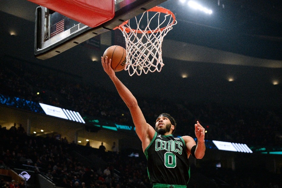 Boston Celtics forward Jayson Tatum (0) scores a basket against the Portland Trail Blazers during the first half at Moda Center. Troy Wayrynen, USA TODAY Sports/Reuters.