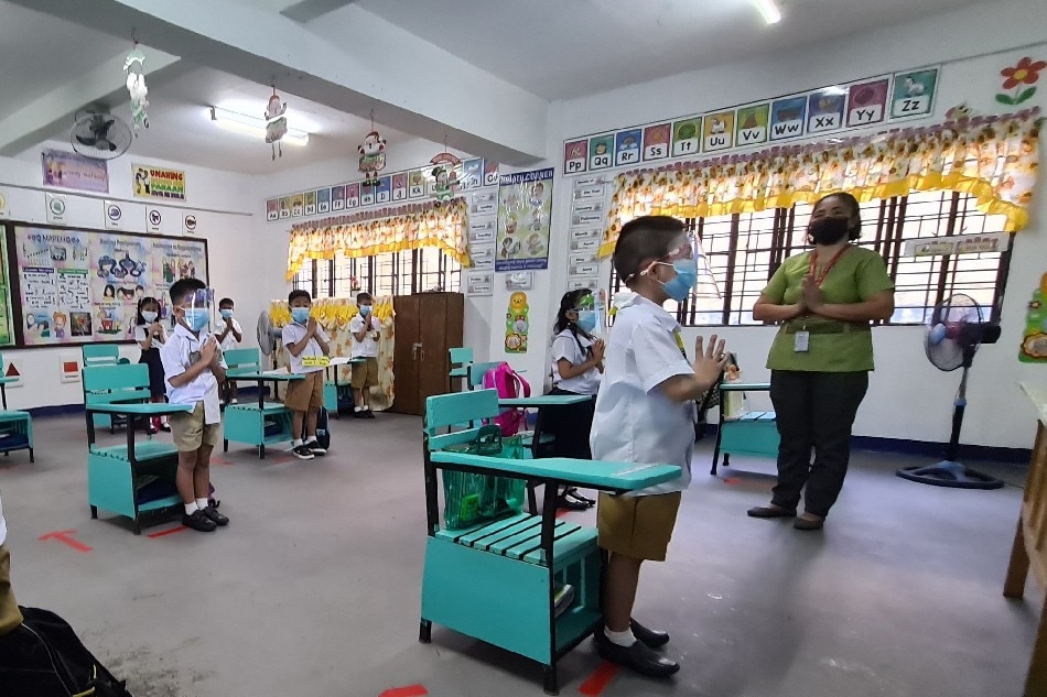 Students at the Pasig Elementary School during the first day of the resumption of in-person classes in Metro Manila on December 6, 2021. Arra Perez, ABS-CBN News