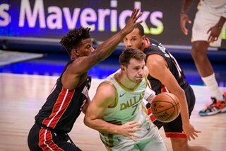 NBA: Doncic guides Mavs past cold-shooting Heat