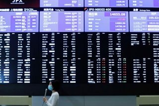 Asia shares start new year in upbeat mood, much already priced in