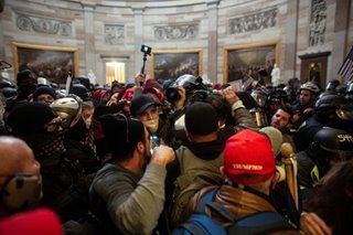 Some US Capitol rioters fired after internet detectives identify them