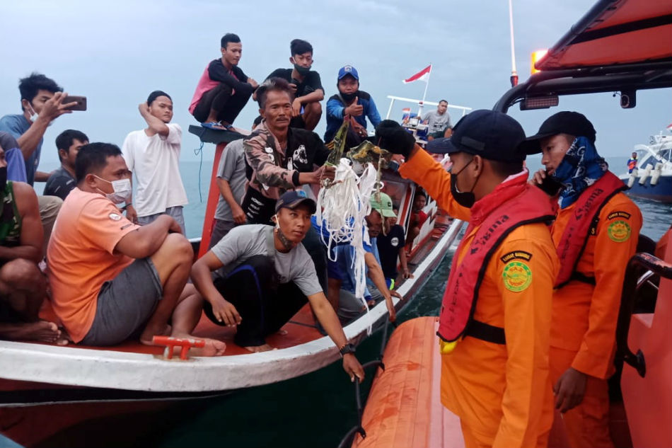 Indonesia locates black boxes of crashed jet as body parts recovered 1