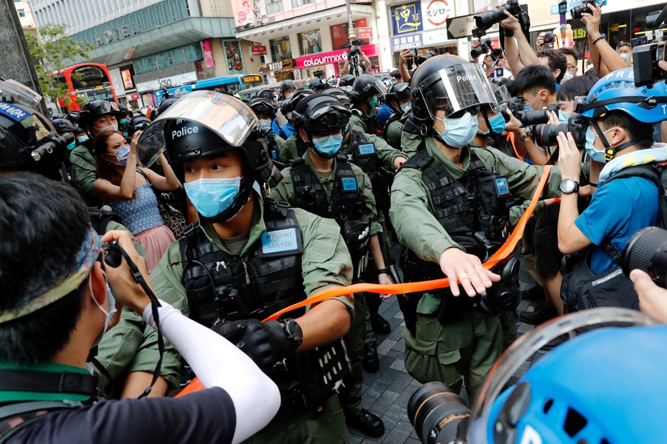 China plans further Hong Kong crackdown after mass arrest - sources 1