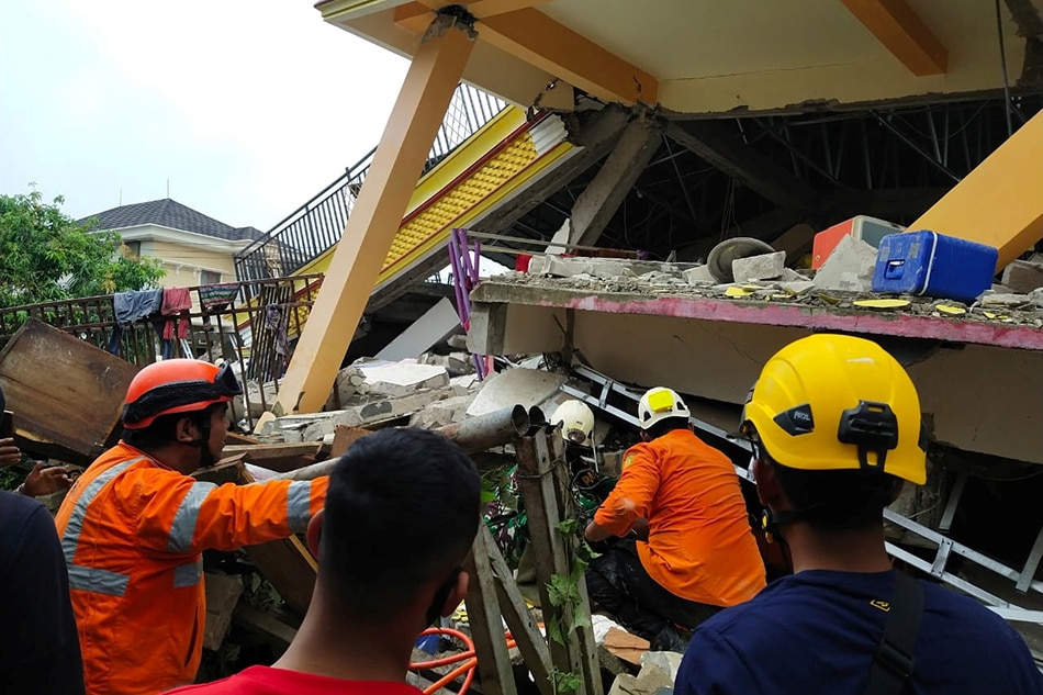 Indonesia hunts for survivors as quake death toll hits 60 1
