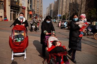 China COVID-19 cases surge to over 10-month high; travel discouraged